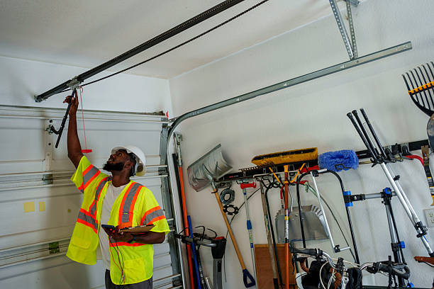 Professional Garage Door Panel Replacement technician working in Bogota, NJ